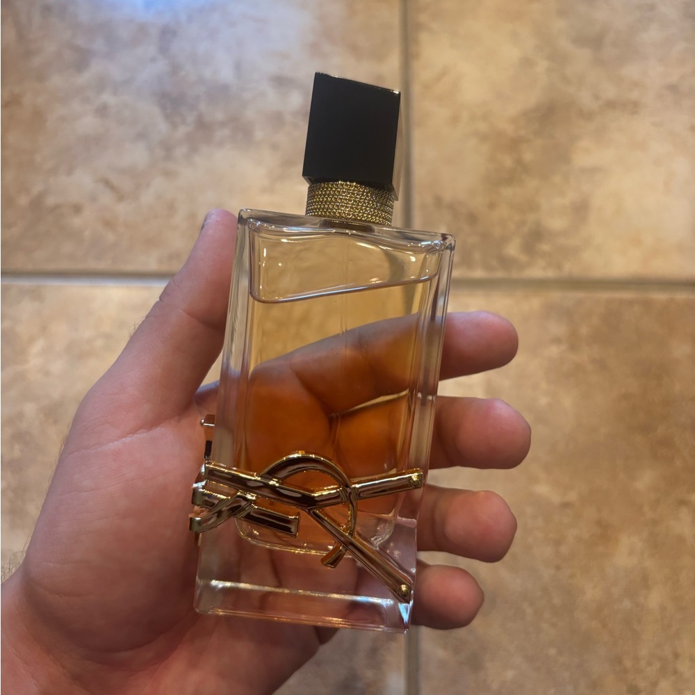 Yves Saint Laurent Perfume with Gold and Black Accents